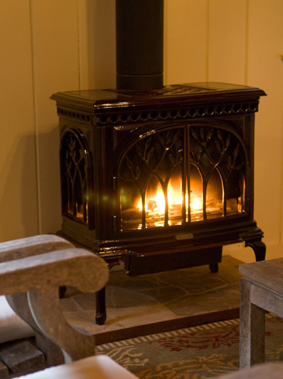 Gas fired cast iron stove