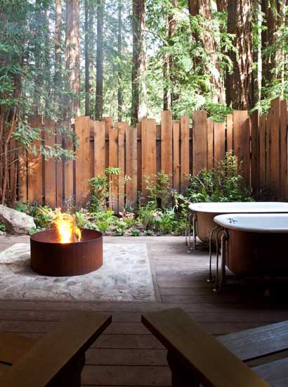 Wood burning fire pits in a private courtyard off the bedroom with a pair of clawfoot soaking tubs.