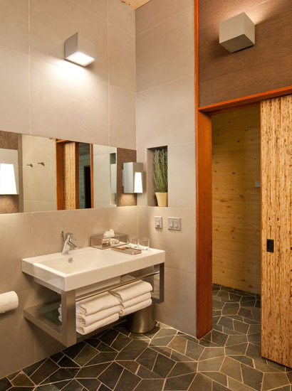 Redwood bark inspired Muir Woods tile adorns the bathroom walls, and our signature heated tile floors.